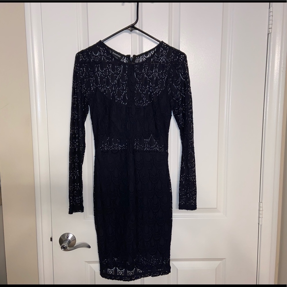 Black laced Bebe long sleeved mini dress